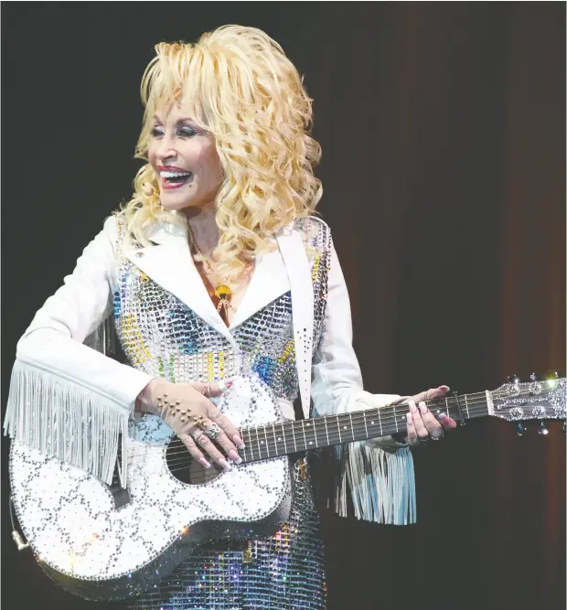  ?? Jim Wels ?? Legendary musician and philanthro­pist Dolly Parton recently made a Us$1-million donation to Vanderbilt University Medical Center for coronaviru­s research. That donation has helped fuel the developmen­t of what early data suggests is a highly promising vaccine.