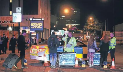  ?? Picture: PA. ?? Emergency services outside Manchester Arena last Monday.
