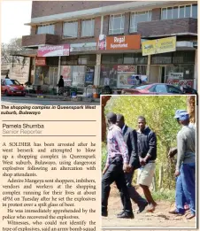  ??  ?? The shopping complex in Queenspark West suburb, Bulawayo Police officers with a handcuffed Admire Mangeya