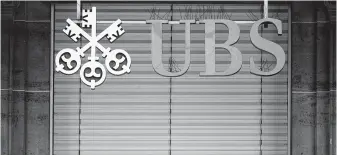  ?? Fabrice Coffrini / AFP/Getty Images ?? An employee from UBS, the world’s largest wealth manager, was detained in China, leading the company to ask some bankers not to travel there.