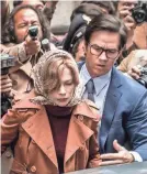  ?? CLAUDIO IANNONE ?? The ransom’s not a given for Gail (Michelle Williams) and Fletcher (Mark Wahlberg).