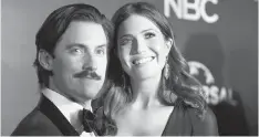  ?? RICH FURY, THE ASSOCIATED PRESS ?? Milo Ventimigli­a, with co-star Mandy Moore: “I saw my mom and dad with a great, great healthy marriage. I think I would absolutely love to have that.”