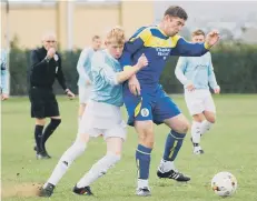  ??  ?? Cask’s man of the match Brad Rowley gets stuck in