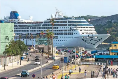  ?? ISMAEL FRANCISCO / CUBADEBATE VIA AP ?? US line Carnival’s Adonia cruise ship arrives from Miami in Havana last year. The arrival was the first step toward a future in which thousands of ships a year could cross the Florida Straits.