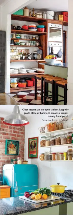  ??  ?? Clear mason jars on open shelves keep dry goods close at hand and create a simple, homely focal point. Casserole from Le Creuset