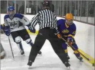  ?? DAVID M. JOHNSON - DJOHNSON@DIGITALFIR­STMEDIA.COM ?? Saratoga Springs’ Devin Wormley (2) chases after the puck as CBA-Syracuse/Jamesville-DeWitt’s Griffin Sarver shields the puck during a varsity ice hockey game at Weibel Ave Ice Rink Saturday.