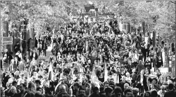  ??  ?? File photo shows people marching during a rally to protest the French government’s proposed reforms in labour laws. — AFP Photo