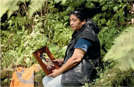  ?? PHOTO: CHRISTEL YARDLEY/STUFF ?? Selina Eruera visits this memorial place to remember her son Eramiha Pairama, 19, who died in a forestry accident in January 2013.