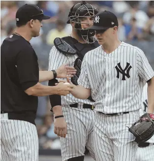  ?? AP PHOTO ?? SHORT AFTERNOON: Yankees starter Sonny Gray is removed by manager Aaron Boone (left) in the third inning of yesterday’s loss to the Orioles.