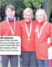  ??  ?? Gold winners Harriers’ Vets Jennifer Reid, Lynn Angley and Bernie O’Neil with their gold medals at West District Cross Country