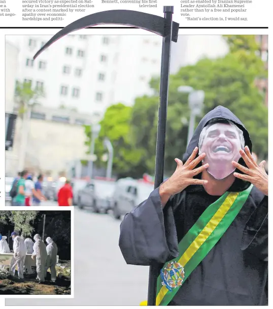  ?? Picture: REUTERS ?? A person dressed up as the grim reaper attends a demonstrat­ion against Brazil’s President Jair Bolsonaro’s handling of the coronaviru­s disease (COVID-19) pandemic and to impeach him, in Rio de Janeiro, Brazil on June 19, 2021.