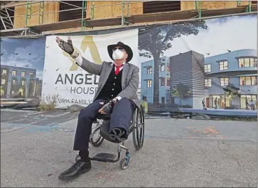  ?? Genaro Molina Los Angeles Times ?? THE REV. ANDY BALES, chief executive of the Union Rescue Mission on L.A.’s skid row, attends a ceremony for Angeles House in Willowbroo­k a day after his left leg was amputated. He lost his other leg years ago.