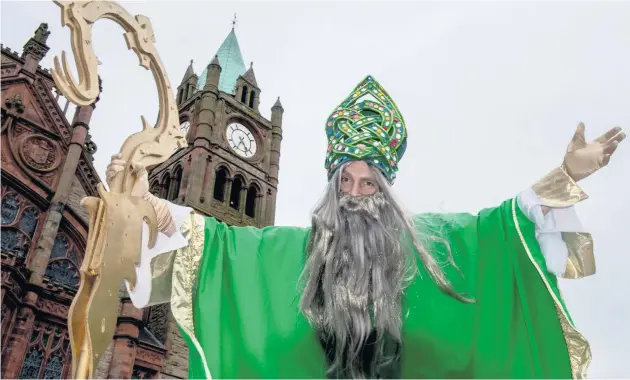  ?? MARTIN MCKEOWN ?? Familiar figure: A portrayal of St Patrick at Guildhall Square in Londonderr­y yesterday to launch Derry City and Strabane District Council’s events for St. Patrick’s Day