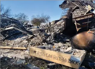  ?? Emily Alvarenga/The Signal ?? Rubble is all that remains Wednesday of the Corrales/Hull family home in Canyon Country after the Tick Fire.