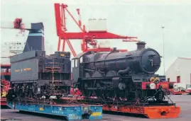  ??  ?? Engine and tender reunited on the Portbury quayside prior to movement by low loader to Didcot for the start of a marathon restoratio­n. ROBIN JONES