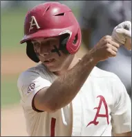  ?? (NWA Democrat-Gazette/Charlie Kaijo) ?? Arkansas second baseman Robert Moore leads the Razorbacks with 29 walks drawn this season and is one of seven Hogs who have at least 20 walks. Arkansas leads the nation with 76 home runs and is fourth with 251 walks.