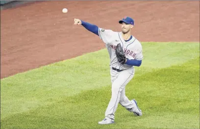  ?? Nick Wass / Associated Press ?? new York’s rick Porcello, who is 1-6 this season, warms up before a game against Washington on friday. the contest was postponed due to inclement weather and will be part of a doublehead­er on Saturday.