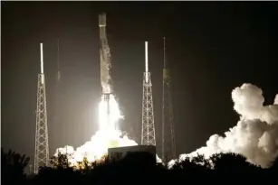  ?? (AP) ?? A SpaceX Falcon 9 rocket with lunar rovers from Japan and the UAE lifts off from Cape Canaveral in December