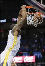  ?? ALONZO ADAMS — USA TODAY SPORTS ?? The Warriors’ Andre Iguodala dunks against the Oklahoma City Thunder on Saturday. He also dished out four assists.