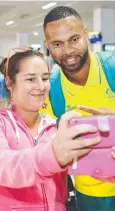  ??  ?? IN PICTURE: Marie Cicciari takes a selfie with Australian official Junior Albert.