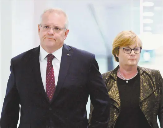  ?? Rohan Thomson / Getty Images ?? Prime Minister Scott Morrison with the new minister for the NDIS, Linda Reynolds.