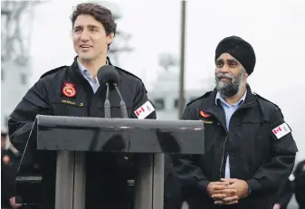  ??  ?? Trudeau and Defence Minister Harjit Sajjan at CFB Esquimalt.