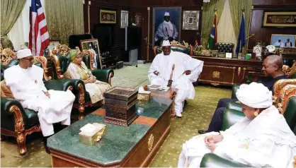  ??  ?? BANJUL: In this photo released by the Nigeria State House, Nigeria President Muhammadu Buhari, left, Liberia President, Ellen Johnson Sirleaf, second from left, Gambia President, Yahya Jammeh, centre, former Ghana President, John Dramani Mahama and an...