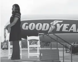  ?? GOODYEAR VIA ASSOCIATED PRESS ?? Savannah James, an Akron native, businesswo­man, philanthro­pist and wife of LeBron James, stands for the National Anthem at the christenin­g of the Goodyear Tire & Rubber Company’s newest airship, the Wingfoot Two on Friday in Akron, Ohio.