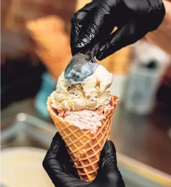  ?? Lisa Nichols / Hearst Connecticu­t Media ?? Coconut chip and sour cherry ice cream from Arethusa Farm Dairy in Bantam on July 15.