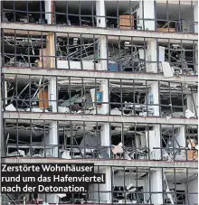  ??  ?? Zerstörte Wohnhäuser rund um das Hafenviert­el nach der Detonation.