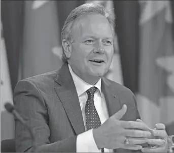  ?? CP PHOTO ?? Bank of Canada governor Stephen Poloz says Canada’s top vulnerabil­ities in its financial system — the housing market and high consumer debt — are showing signs of easing.