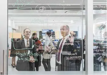  ??  ?? caption Principal David Gee shows WA Chief Scientist Professor Peter Klinken the ‘writable’ walls.