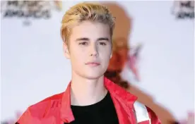  ?? — AP photos ?? In this Nov 7, 2015 file photo, Justin Bieber arrives at the Cannes festival palace in Cannes, southeaste­rn France.