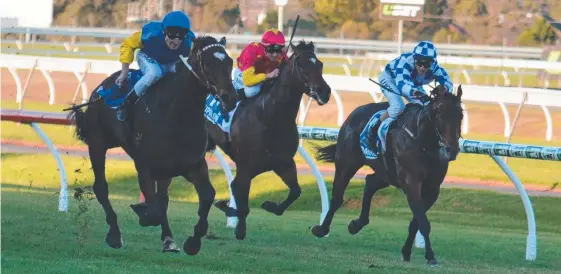  ??  ?? The Darren Weir-trained Black Heart Bart (left) storms home to win the Group 1 Goodwood at Morphettvi­lle last year.