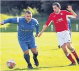  ??  ?? Stuck in The Burgh defence had to be on their toes as Lanark piled on the pressure