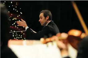  ?? File photo by Jerry Habraken ?? Texarkana Symphony Orchestra Conductor Marc-Andre Bougie leads the orchestra. On Sunday, Dec. 13, TSO presents “Christmas at the Perot,” a family concert show celebratin­g the holiday season.