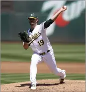  ?? JED JACOBSOHN — THE ASSOCIATED PRESS ?? Oakland Athletics starting pitcher Cole Irvin throws against the Cleveland Guardians during the third inning of a baseball game in Oakland Saturday.