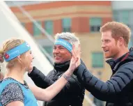  ??  ?? Congrats Mhairi Duff gets a high five from Prince Harry