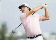  ?? GREGORY SHAMUS / Getty Images ?? Doc Redman plays his shot from the 15th tee during the third round of the Bermuda Championsh­ip at Port Royal Golf Course on Saturday in Southampti­on, Bermuda.