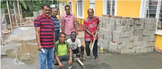  ?? Photo: Shratika Naidu ?? Shree Sanatan Dharm Nasea Ramayan Mandali president, Pradeep Kumar (left), with trustees and workers as the renovation of the Mandir in Labasa on June 5,2020.