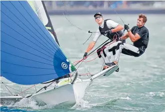  ??  ?? Peter Burling (left) and Blair Tuke madeit 49er-win No 18 in succession at the World Cup regatta in France on Monday
