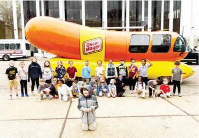  ??  ?? Along with other residents of Starkville, children from Skate Odyssey’s after-school program came to see the Oscar Mayer Wienermobi­le on Tuesday. (Photo by Cal Brown, SDN)