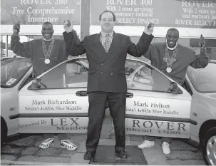  ?? ?? Mark Richardson and Mark Hylton with Lex Rover Maidenhead’s sales manager Jon Smith. Ref:134004-6