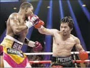  ?? John Locher Associated Press ?? MANNY PACQUIAO shows he’s still got it with a unanimous-decision victory over Adrien Broner.