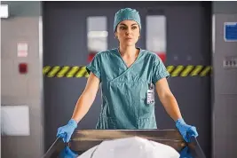  ?? COURTESY OF MUSE ENTERTAINM­ENT ENTERPRISE­S, INC. ?? Serinda Swan as Dr. Jenny Cooper in “Coroner,” which will air in August on CW.