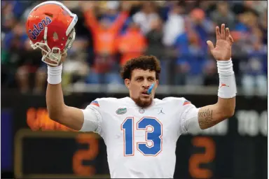  ?? (AP file photo) ?? Former Florida Gators starting quarterbac­k Feleipe Franks, now with the Razorbacks, impressed the Boston Red Sox enough with his baseball skills that the organizati­on drafted him with the 947th overall pick in 2019.