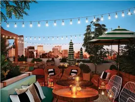  ??  ?? TROPICAL MANSION: The rooftop bar at Little House in Miami
