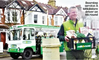  ??  ?? Doorstep service: A Milk&More driver on his round