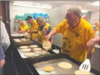  ?? Submitted photo ?? PANCAKE DAY: Preparatio­n for the annual Pancake Day fundraiser by the Hot Springs Village Evening Lions Club begins the night before.