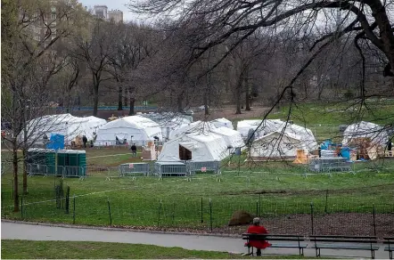  ?? AP ?? Christian aid organisati­on Samaritan’s Purse sets up an emergency field hospital with a respirator­y unit in New York City’s Central Park yesterday. New York state has become America’s deadliest coronaviru­s hot spot.